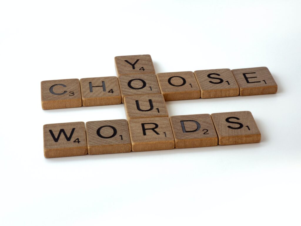 Scrabble tiles saying 'Choose your words'. 